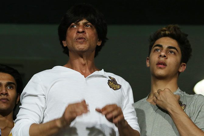 Shah Rukh Khan and son Aryan watch the Indian Premier League, season 8, opening match at Eden Gardens in Kolkata on Wednesday
