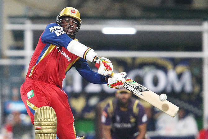 RCB's player Chris Gayle plays a shot against Kolkata Knight Riders during their IPL match at Eden Garden in Kolkata on Saturday