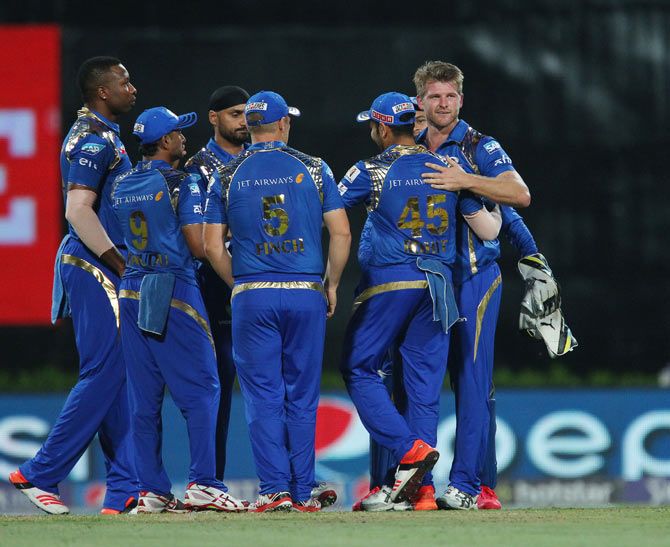 Corey Anderson of the Mumbai Indians celebrates with his teammates