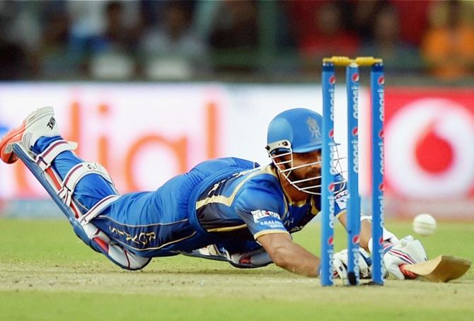 Rajasthan Royals batsman Ajinkya Rehane dives