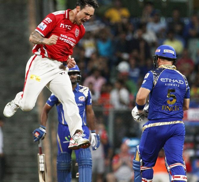 Kings XI Punjab player Mitchell Johnson celebrates