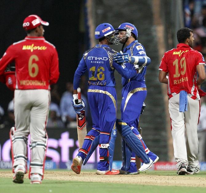 Mumbai Indians player J Suchith congratulates Harbhajan Singh