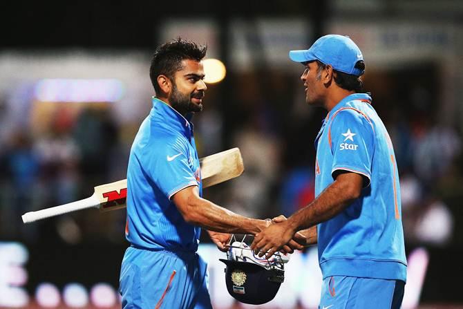 Virat Kohli (left) and Mahendra Singh Dhoni