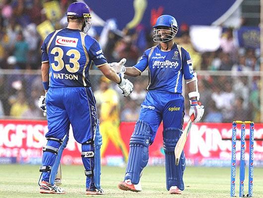 Rajasthan Royals player Ajinkya Rahane congratulates his captain Shane Watson after scoring a fifty