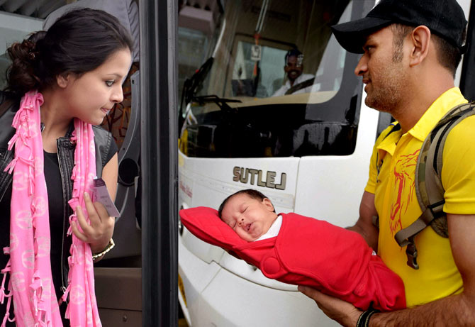 MS Dhoni with wife and daughter