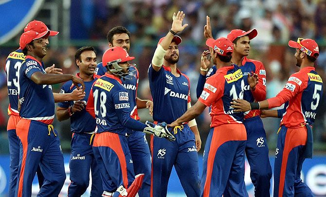 Delhi Daredevils players celebrate a wicket