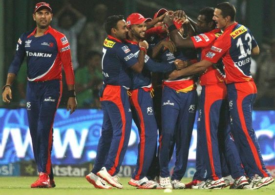 Delhi Daredevils players celebrate the fall of a Mumbai Indians wicket during their Indian Premier League match at Ferozshah Kotla