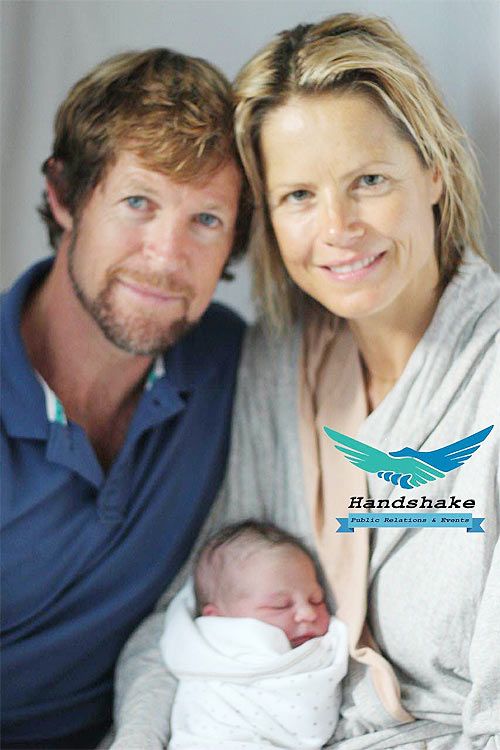 Jonty Rhodes and wife Melanie with his newborn India Jeanne