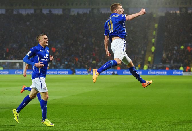 Marc Albrighton of Leicester City (right) celebrates scoring the opening goal against Chelsea 
