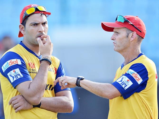 Yuvraj Singh with coach