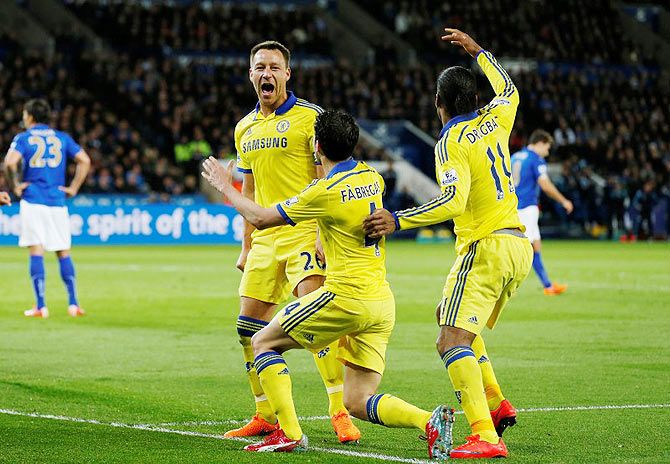  John Terry celebrates with teammates after scoring the second goal for Chelsea against Leicester City during their English Premier League at The King Power Stadium in Leicester, on Wednesday