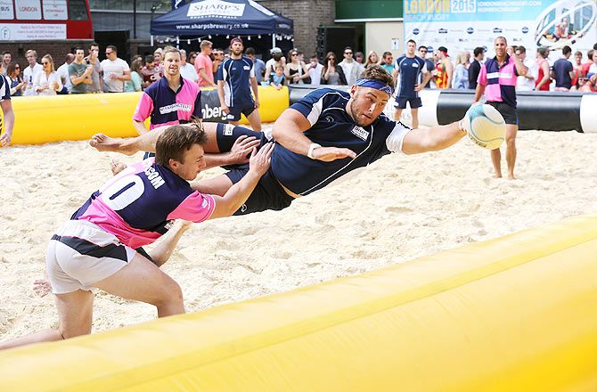 Players in action at London Beach Rugby, a two day touch rugby event in aid to help Heroes at Finsbury Square in London on August 1