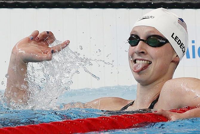 Katie Ledecky from US celebrates after setting a new World Record in the women's 1500m freestyle heats at the Aquatics World Championships in Kazan, Russia