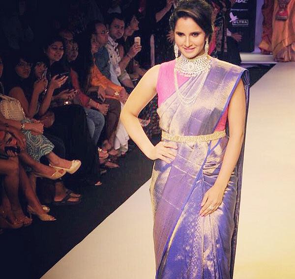 India tennis ace Sania Mirza walks the ramp at the India International Jewellery Week on Monday