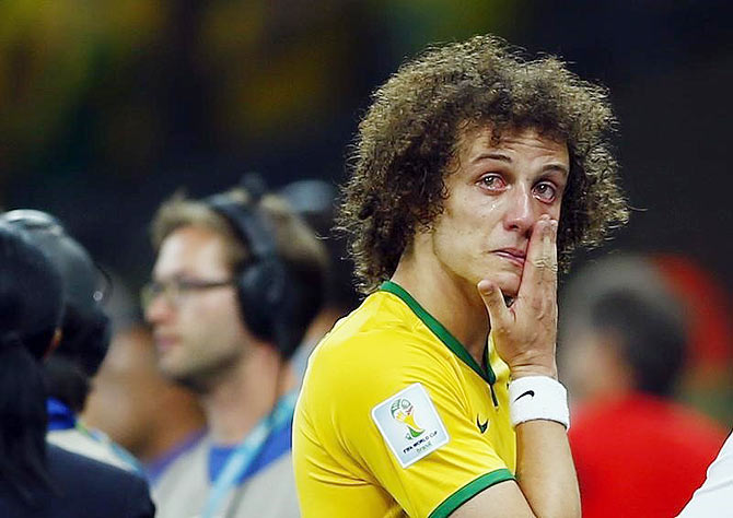 Brazil's David Luiz cries after his team lost to Germany in their 2014 World Cup semi-final on July 8 last year