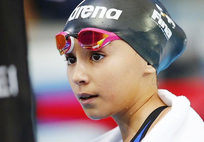 Ten year-old Alzain Tareq of Bahrain reacts after her women's 50m butterfly heat at the Aquatics World Championships in Kazan, Russia, on Friday