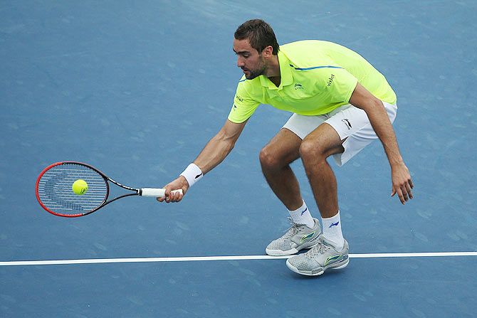 Croatia's Marin Cilic returns a shot to Germany's Alexander Zverev during the Citi Open at Rock Creek Park Tennis Center in Washington on Friday