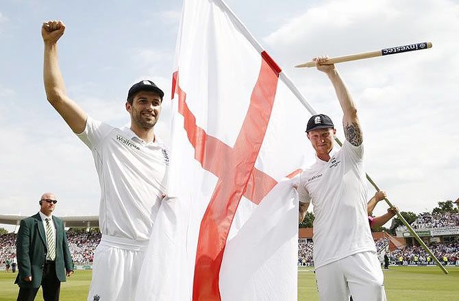 England's Mark Wood and Ben Stokes celebrate after winning the Ashes