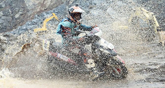 Nashik’s Shamim Khan negotiates the slushy terrain during the Gulf Monsoon Scooter Rally in Navi Mumbai on Sunday
