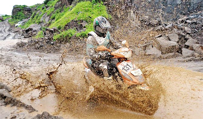 Jodhpur's Abhishek Diwaker astride the Mahindra Rodeo is covered in slush as he rides through the challenging hilly terrain