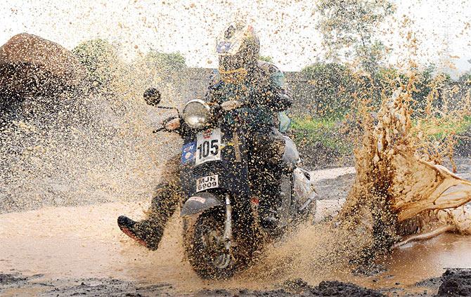 Team Ceat's Pinkesh Thakkar manouvers through the tricky track