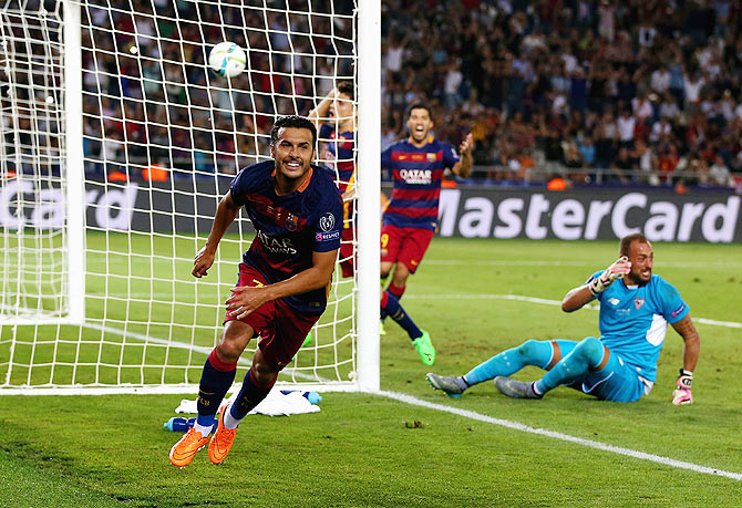 Barcelona's Pedro celebrates scoring the extra-time winner past Sevilla'S Beto