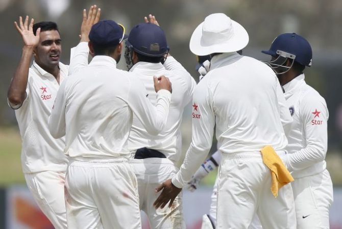 India’s Ravichandran Ashwin celebrates a wicket with teammates
