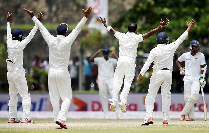 India's Amit Mishra (centre), captain Virat Kohli (2nd from left), Rohit Sharma (right) and Lokesh Rahul appeal unsuccessfully for the wicket of Sri Lanka's Lahiru Thirimanne