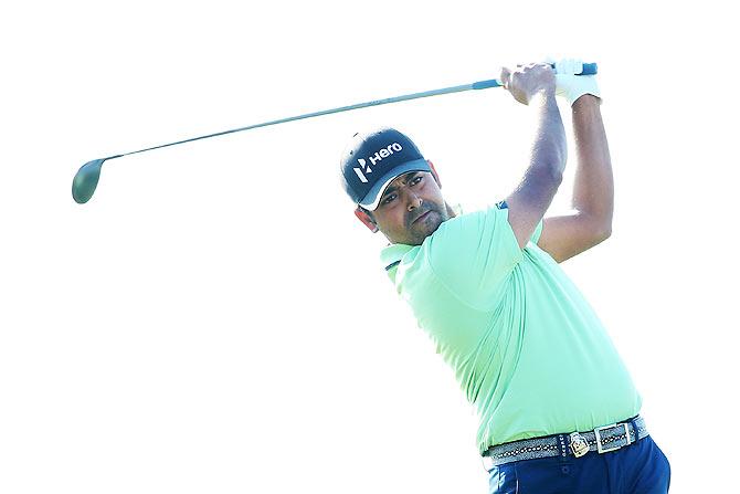 India's Anirban Lahiri plays his shot from the ninth tee during the continuation of the weather-delayed second round of the 2015 PGA Championship at Whistling Straits on Saturday