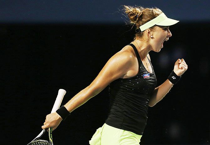 Belinda Bencic celebrates a point against Serena Williams