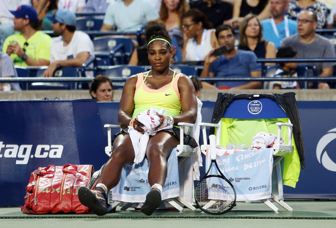 Serena Williams of the USA ponders during a break in play in her semi-final match against Switzerland's Belinda Bencic in the Rogers Cup at the Aviva Centre in Toronto on Saturday