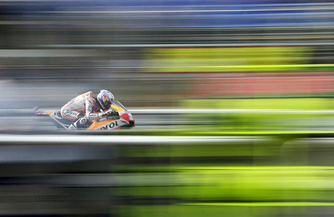 Honda MotoGP's Spainish rider Dani Pedrosa competes during the third free practice of the Czech Grand Prix in Brno, Czech Republic on Saturday, August 15