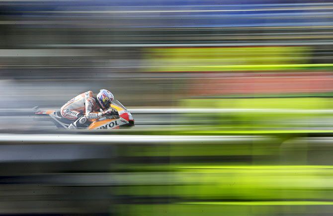 Honda MotoGP's Spainish rider Dani Pedrosa competes during the third free practice of the Czech Grand Prix in Brno, Czech Republic on Saturday, August 15
