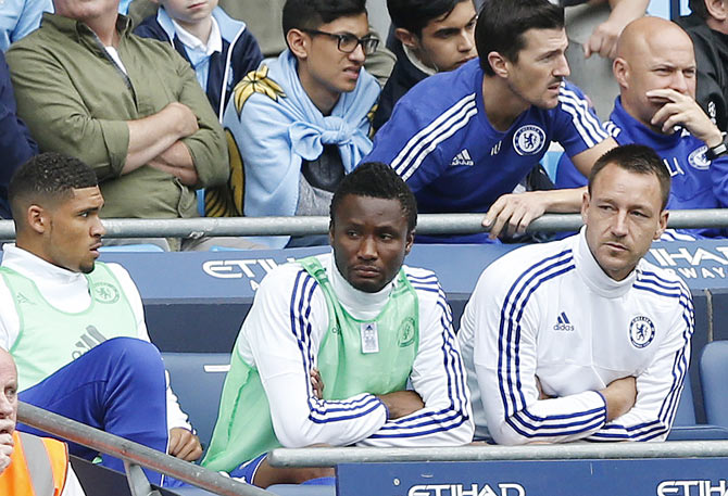 Chelsea's John Terry sat on the bench after being substituted at half time during the Premier League match against Manchester City