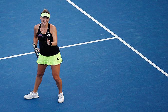 Switzerland's Belinda Bencic celebrates after defeating Germany's Angelique Kerber on Tuesday