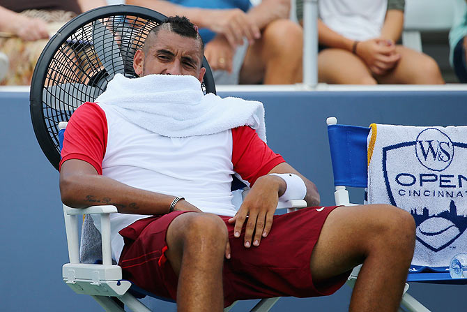 Australia's Nick Kyrgios takes a break between sets during his first round match against France's Richard Gasquet. Krygios eventually lost the match