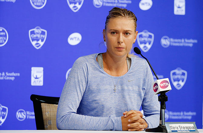 Russia's Maria Sharapova addresses a news conference after withdrawing from the Western & Southern Open at the Linder Family Tennis Center in Cincinnati on Tuesday