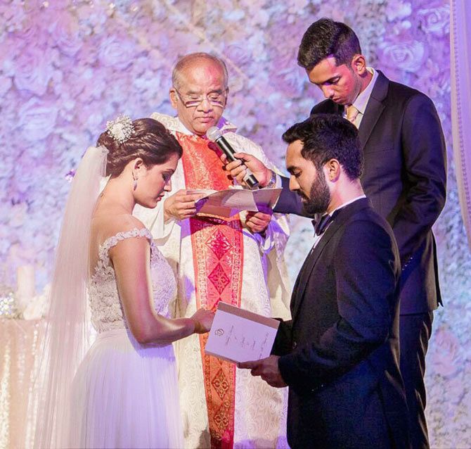 Cricketer Dinesh Karthik and ace squash player Deepika Pallikal read out their vows during their wedding ceremony in Chennai on Tuesday