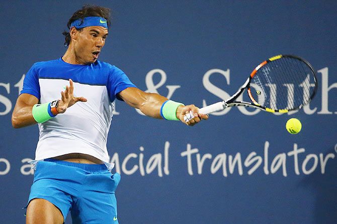 Spain's Rafael Nadal returns a shot to France's Jeremy Chardy