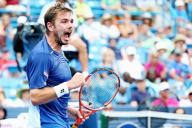 Switzerland's Stanislas Wawrinka reacts after winning a tie-breaker to end the second set against Croatia's Borna Coric during the Western & Southern Open at the Lidler Family Tennis Center in Cincinnati on Wednesday