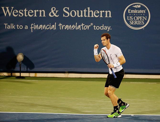 Great Britain's Andy Murray celebrates after defeating Bulgaria's Grigor Dimitrov