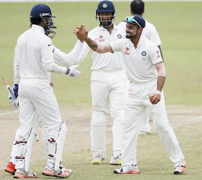 Virat Kohli celebrates a wicket