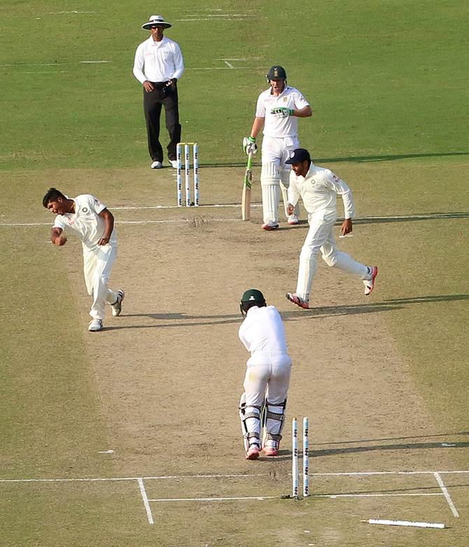 Umesh Yadav celebrates after having J P Duminy clean bowled