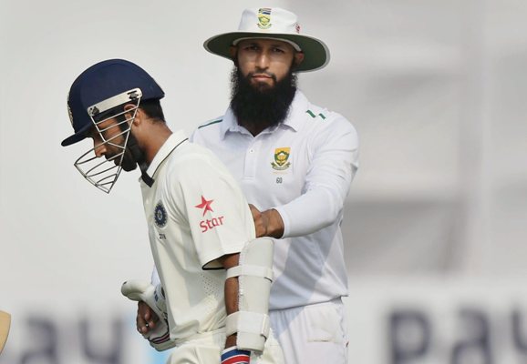 South Africa captain Hashim Amla greets India's Ajinkya Rahane after his century 