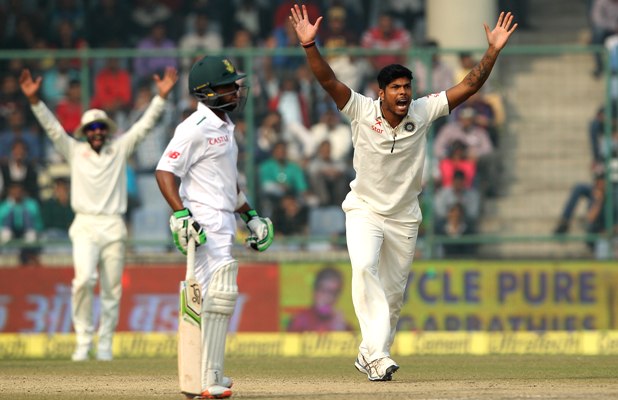 Umesh Yadav of India appeals for the wicket of Hashim Amla captain of South Africa as Temba Bavuma looks on 