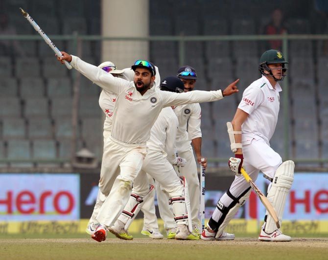 India skipper Virat Kohli celebrates after the fall of South Africa's last wicket in the fourth Test at the Feroz Shah Kotla, in New Delhi, on Monday.