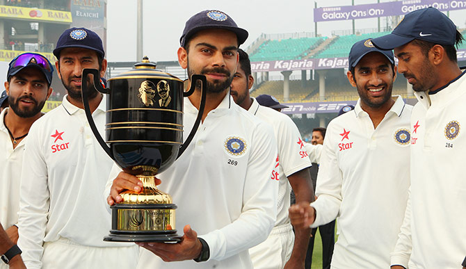 Indian captain Virat Kohli with the series trophy 