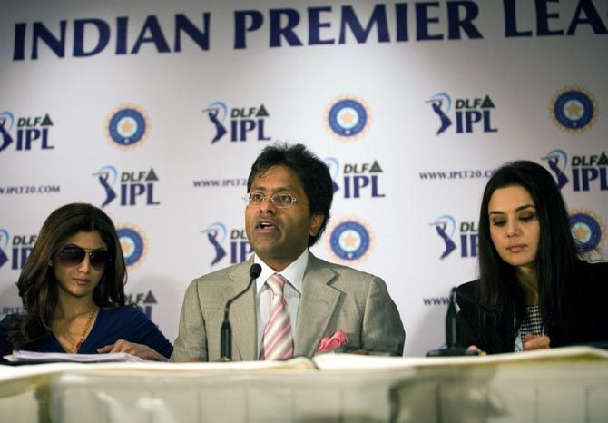 Former IPL commissioner Lalit Modi, centre, during the 2010 Players' Auction with then Rajasthan Royals co-owner Shilpa Shetty, left, and Kings XI Punjab co-owner Preity Zinta