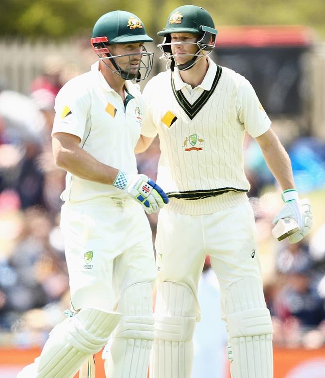 Adam Voges of Australia pats Shaun Marsh