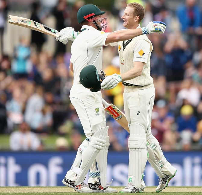  Australia's Adam Voges celebrates with teammate Shaun Marsh